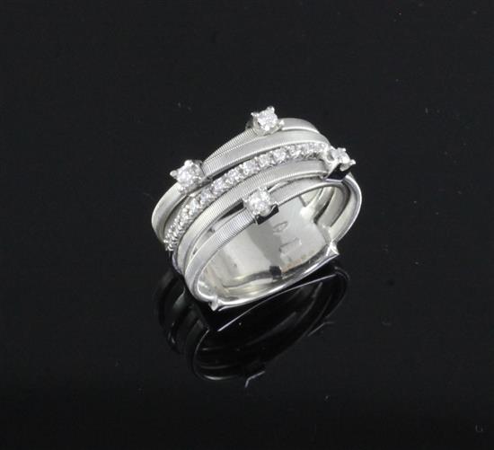 An Italian Marco Bicego 18ct white gold and diamond set multi band dress ring, size K.